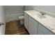 New bathroom featuring a white vanity with modern sink and hardware, and a shower-tub combination at 2113 Boxwood Se Cir, Conyers, GA 30094