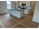 Modern kitchen with a granite island, stainless steel appliances, and ample counter space at 2113 Boxwood Se Cir, Conyers, GA 30094