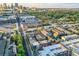 Gorgeous aerial view of neighborhood homes with beautiful trees and the city skyline in the background at 8 Bass Se St, Atlanta, GA 30315