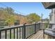 Relaxing balcony with wood floors, city views and ample seating at 8 Bass Se St, Atlanta, GA 30315