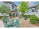 Relaxing courtyard featuring Adirondack chairs on a pea gravel base, surrounded by lush landscaping at 8 Bass Se St, Atlanta, GA 30315