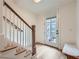 Bright entryway with hardwood floors, a staircase, and a doorway to the balcony at 8 Bass Se St, Atlanta, GA 30315