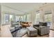 Inviting living room with ample seating, bright windows, and a stylish rug at 8 Bass Se St, Atlanta, GA 30315