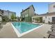Community pool with lounge chairs, surrounded by well-maintained landscaping and modern architecture at 8 Bass Se St, Atlanta, GA 30315