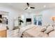 Sunlit main bedroom with a ceiling fan, and outside access to a patio space at 1506 Avon Sw Ave, Atlanta, GA 30311