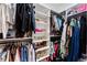 A well-organized walk-in closet with shelving and hanging racks provides ample storage space at 1506 Avon Sw Ave, Atlanta, GA 30311