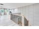 Well-lit hallway features light wood flooring and decorative wall paneling at 1506 Avon Sw Ave, Atlanta, GA 30311