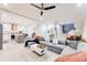 Expansive living room that shows the kitchen, dining area, and staircase, all in an open-concept design at 1506 Avon Sw Ave, Atlanta, GA 30311