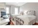Inviting bedroom with two twin beds, a desk, and ample natural light from nearby windows at 3635 E Paces Ne Cir # 1308, Atlanta, GA 30326