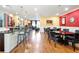 Spacious clubhouse features a bar, ample seating, and hardwood floors at 3635 E Paces Ne Cir # 1308, Atlanta, GA 30326