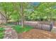 Community dog park with grass and tree coverage for shade at 3635 E Paces Ne Cir # 1308, Atlanta, GA 30326