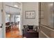 Inviting foyer with hardwood floors and stylish decor, including a bench with decorative pillows at 3635 E Paces Ne Cir # 1308, Atlanta, GA 30326