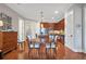 Charming kitchen seamlessly connects to dining, showcasing elegant hardwood flooring and modern appliances at 3635 E Paces Ne Cir # 1308, Atlanta, GA 30326