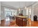 Stylish kitchen flowing into a living area with hardwood floors and elegant finishes at 3635 E Paces Ne Cir # 1308, Atlanta, GA 30326