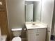Cozy bathroom featuring a white vanity, toilet, and shower with tiled accents, offering a clean and functional space at 3923 High Dove Sw Way # 16, Smyrna, GA 30082