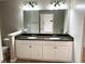 Bathroom featuring double sink vanity with granite countertop and tiled flooring at 3923 High Dove Sw Way # 16, Smyrna, GA 30082
