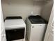 Well-equipped laundry room featuring new washer and dryer and neutral walls at 3923 High Dove Sw Way # 16, Smyrna, GA 30082