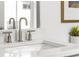 Close up of bathroom vanity with modern faucet and fixtures, and a window with greenery at 1770 Beckham Ne Pl # 47, Atlanta, GA 30324