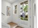 Bright entryway with a view through the door to the community and landscaping at 1770 Beckham Ne Pl # 47, Atlanta, GA 30324