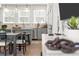 Bright eat-in kitchen with stainless steel appliances, granite countertops, and light wood flooring at 1770 Beckham Ne Pl # 47, Atlanta, GA 30324