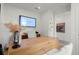 Well-lit home office featuring a modern desk, comfortable seating, and television at 1770 Beckham Ne Pl # 47, Atlanta, GA 30324