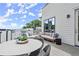 Spacious rooftop deck perfect for entertaining with outdoor dining and lounge seating area at 1770 Beckham Ne Pl # 47, Atlanta, GA 30324