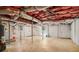 Unfinished basement with white-painted walls and concrete floor, featuring mechanical systems, offering potential for various uses at 679 Forest Ridge Se Dr, Marietta, GA 30067