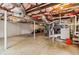 Unfinished basement with exposed ductwork, supports, and concrete floors, providing ample space for storage or future customization at 679 Forest Ridge Se Dr, Marietta, GA 30067