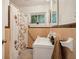 Bathroom featuring vintage tile, walk in shower and window with privacy at 679 Forest Ridge Se Dr, Marietta, GA 30067
