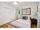 Bright bedroom featuring a comfortable bed, stylish decor, and ample natural light at 679 Forest Ridge Se Dr, Marietta, GA 30067