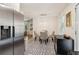 Open concept layout connecting the kitchen to the dining area, featuring stylish tile floors and stainless steel appliances at 679 Forest Ridge Se Dr, Marietta, GA 30067