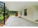 Covered outdoor patio area, perfect for relaxing or entertaining, with views of the backyard at 679 Forest Ridge Se Dr, Marietta, GA 30067