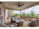 Spacious deck with wooden railings offers a cozy outdoor living space, complete with seating, dining area, and green views at 1867 Sterling Chase, Buford, GA 30518
