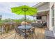 Enjoy outdoor living on this deck with a dining set, grill, seating area, and views of the backyard and covered deck at 1867 Sterling Chase, Buford, GA 30518