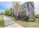 Street view of a two-story home with covered porch, brick facade, and mature landscaping at 1867 Sterling Chase, Buford, GA 30518