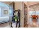 Hallway view with an open doorway to a bedroom on the left and a dining room on the right at 1867 Sterling Chase, Buford, GA 30518