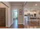 Open-concept kitchen with a large island, modern appliances, and seating, perfect for entertaining and casual dining at 1867 Sterling Chase, Buford, GA 30518