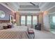 Spacious main bedroom with a sitting area, and ensuite bathroom at 1867 Sterling Chase, Buford, GA 30518