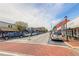 Street view of Boutique Shops and street parking on brick sidewalk in Buford, GA at 1867 Sterling Chase, Buford, GA 30518