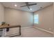 Study featuring a ceiling fan, neutral colors and simple desk at 1867 Sterling Chase, Buford, GA 30518