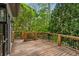 Exterior wood deck with views of trees and foliage in a private setting at 3646 Sope Creek Farm Se, Marietta, GA 30067