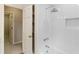 Bathroom features new shower with white subway tile, and a storage niche at 3646 Sope Creek Farm Se, Marietta, GA 30067