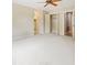 Spacious bedroom showcasing neutral carpet, ample closet space, and a modern ceiling fan at 3646 Sope Creek Farm Se, Marietta, GA 30067
