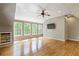 Spacious bonus room with wood flooring, a ceiling fan, recessed lights, and many windows for ample natural light at 3646 Sope Creek Farm Se, Marietta, GA 30067