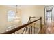 Grand foyer featuring a chandelier, staircase, and beautiful hardwood floors at 3646 Sope Creek Farm Se, Marietta, GA 30067