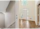 Bright foyer featuring hardwood floors and a front door with sidelights at 3646 Sope Creek Farm Se, Marietta, GA 30067