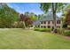 Traditional home boasting lush landscaping and a spacious front yard at 3646 Sope Creek Farm Se, Marietta, GA 30067