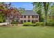 Charming brick home with a well-manicured lawn and mature landscaping at 3646 Sope Creek Farm Se, Marietta, GA 30067
