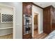 Custom wood cabinets, granite countertops, and stainless appliances add convenience to this kitchen at 3646 Sope Creek Farm Se, Marietta, GA 30067
