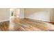 Living room featuring hardwood floors and large window with natural lighting at 3646 Sope Creek Farm Se, Marietta, GA 30067